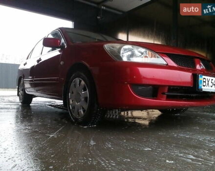 Червоний Міцубісі Lancer, об'ємом двигуна 1.6 л та пробігом 242 тис. км за 5100 $, фото 7 на Automoto.ua