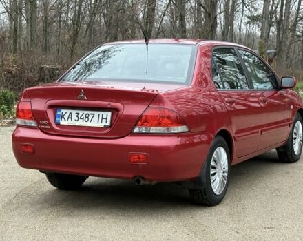 Червоний Міцубісі Lancer, об'ємом двигуна 1.6 л та пробігом 220 тис. км за 4600 $, фото 6 на Automoto.ua