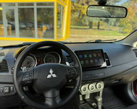 Червоний Міцубісі Lancer, об'ємом двигуна 2 л та пробігом 215 тис. км за 6500 $, фото 13 на Automoto.ua