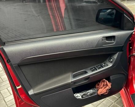 Червоний Міцубісі Lancer, об'ємом двигуна 2 л та пробігом 137 тис. км за 8500 $, фото 9 на Automoto.ua