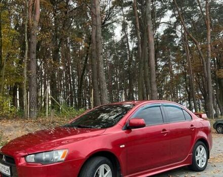 Красный Мицубиси Лансер, объемом двигателя 2 л и пробегом 197 тыс. км за 6500 $, фото 6 на Automoto.ua