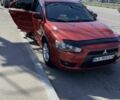 Червоний Міцубісі Lancer, об'ємом двигуна 2 л та пробігом 320 тис. км за 5502 $, фото 1 на Automoto.ua