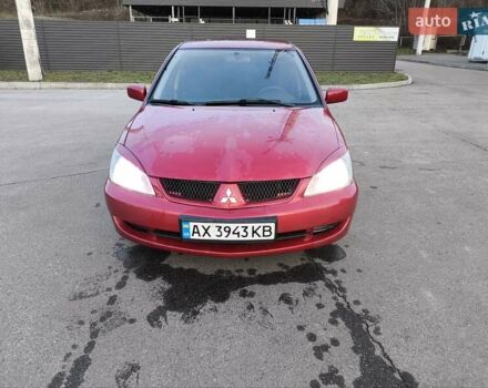 Червоний Міцубісі Lancer, об'ємом двигуна 1.58 л та пробігом 140 тис. км за 6000 $, фото 24 на Automoto.ua