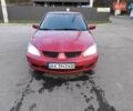 Червоний Міцубісі Lancer, об'ємом двигуна 1.58 л та пробігом 140 тис. км за 6000 $, фото 24 на Automoto.ua