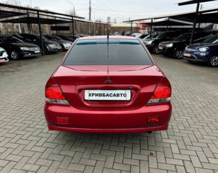 Красный Мицубиси Лансер, объемом двигателя 1.6 л и пробегом 215 тыс. км за 4500 $, фото 7 на Automoto.ua