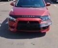 Червоний Міцубісі Lancer, об'ємом двигуна 2 л та пробігом 223 тис. км за 5900 $, фото 1 на Automoto.ua
