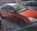 Красный Мицубиси Лансер, объемом двигателя 1.6 л и пробегом 124 тыс. км за 4300 $, фото 1 на Automoto.ua