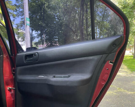 Червоний Міцубісі Lancer, об'ємом двигуна 1.6 л та пробігом 270 тис. км за 5699 $, фото 34 на Automoto.ua