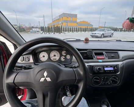 Красный Мицубиси Лансер, объемом двигателя 1.6 л и пробегом 276 тыс. км за 4550 $, фото 10 на Automoto.ua