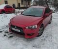 Червоний Міцубісі Lancer, об'ємом двигуна 2 л та пробігом 173 тис. км за 7200 $, фото 1 на Automoto.ua