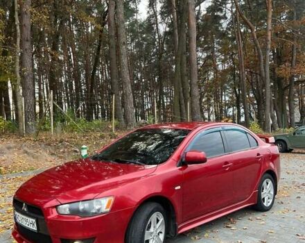 Красный Мицубиси Лансер, объемом двигателя 2 л и пробегом 197 тыс. км за 6500 $, фото 4 на Automoto.ua