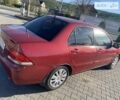 Червоний Міцубісі Lancer, об'ємом двигуна 0 л та пробігом 160 тис. км за 4244 $, фото 23 на Automoto.ua