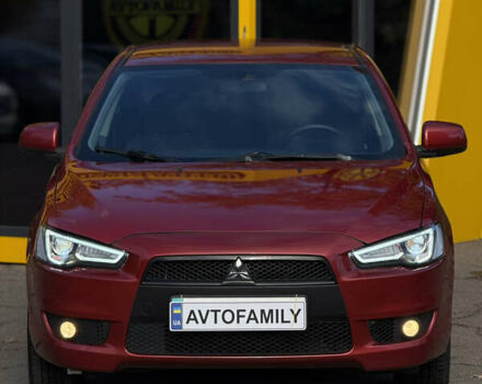Червоний Міцубісі Lancer, об'ємом двигуна 2 л та пробігом 215 тис. км за 6500 $, фото 1 на Automoto.ua