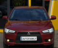 Червоний Міцубісі Lancer, об'ємом двигуна 2 л та пробігом 215 тис. км за 6500 $, фото 1 на Automoto.ua