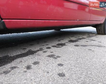 Червоний Міцубісі Lancer, об'ємом двигуна 1.58 л та пробігом 140 тис. км за 6000 $, фото 12 на Automoto.ua