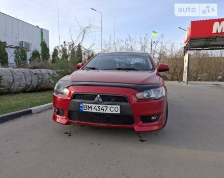 Червоний Міцубісі Lancer, об'ємом двигуна 2 л та пробігом 223 тис. км за 6950 $, фото 5 на Automoto.ua