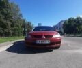 Червоний Міцубісі Lancer, об'ємом двигуна 1.6 л та пробігом 195 тис. км за 5500 $, фото 4 на Automoto.ua