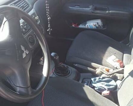 Мицубиси Лансер 2008 в Львове на Automoto.ua Красный Мицубиси Лансер, объемом двигателя 1.58 л и пробегом 280 тыс. км за 3200 $, фото 13 на Automoto.ua