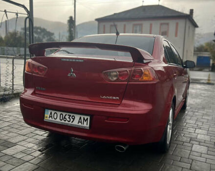 Червоний Міцубісі Lancer, об'ємом двигуна 2 л та пробігом 150 тис. км за 7000 $, фото 5 на Automoto.ua