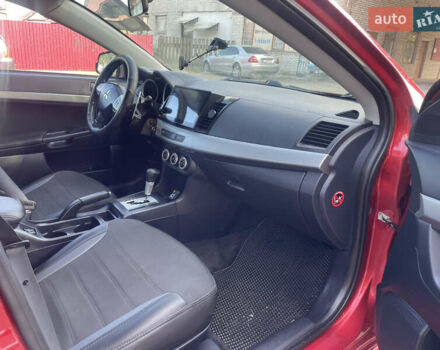 Червоний Міцубісі Lancer, об'ємом двигуна 2 л та пробігом 179 тис. км за 6499 $, фото 1 на Automoto.ua