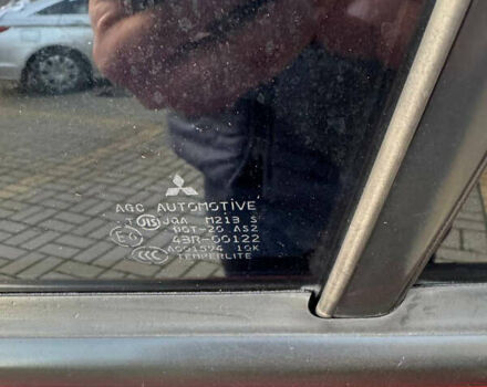 Красный Мицубиси Лансер, объемом двигателя 2 л и пробегом 143 тыс. км за 5200 $, фото 23 на Automoto.ua