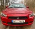 Червоний Міцубісі Lancer, об'ємом двигуна 0 л та пробігом 124 тис. км за 7555 $, фото 13 на Automoto.ua