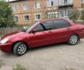Красный Мицубиси Лансер, объемом двигателя 1.6 л и пробегом 180 тыс. км за 4844 $, фото 1 на Automoto.ua