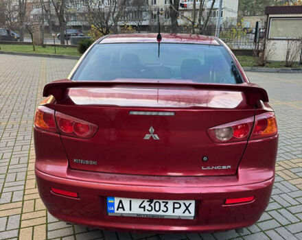 Красный Мицубиси Лансер, объемом двигателя 2 л и пробегом 143 тыс. км за 5200 $, фото 10 на Automoto.ua