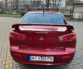 Красный Мицубиси Лансер, объемом двигателя 2 л и пробегом 143 тыс. км за 5200 $, фото 10 на Automoto.ua