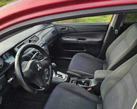 Червоний Міцубісі Lancer, об'ємом двигуна 1.6 л та пробігом 220 тис. км за 5800 $, фото 8 на Automoto.ua