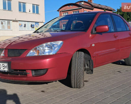 Красный Мицубиси Лансер, объемом двигателя 1.6 л и пробегом 155 тыс. км за 4150 $, фото 2 на Automoto.ua