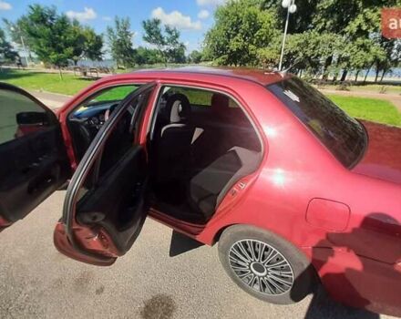 Червоний Міцубісі Lancer, об'ємом двигуна 1.6 л та пробігом 195 тис. км за 5500 $, фото 1 на Automoto.ua