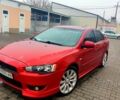 Червоний Міцубісі Lancer, об'ємом двигуна 2 л та пробігом 172 тис. км за 7000 $, фото 7 на Automoto.ua