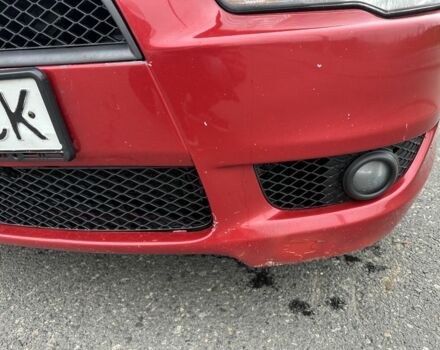 Красный Мицубиси Лансер, объемом двигателя 2 л и пробегом 366 тыс. км за 6500 $, фото 17 на Automoto.ua