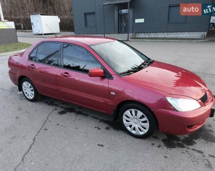 Червоний Міцубісі Lancer, об'ємом двигуна 1.58 л та пробігом 140 тис. км за 6000 $, фото 19 на Automoto.ua