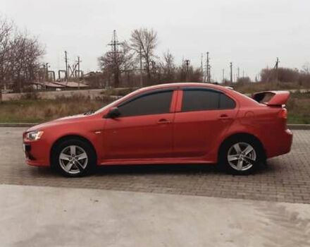 Красный Мицубиси Лансер, объемом двигателя 2 л и пробегом 200 тыс. км за 6000 $, фото 4 на Automoto.ua