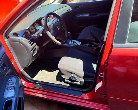 Красный Мицубиси Лансер, объемом двигателя 1.6 л и пробегом 140 тыс. км за 5500 $, фото 7 на Automoto.ua