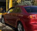 Червоний Міцубісі Lancer, об'ємом двигуна 2 л та пробігом 215 тис. км за 6500 $, фото 28 на Automoto.ua