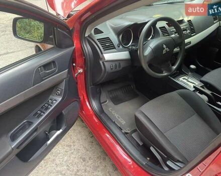 Красный Мицубиси Лансер, объемом двигателя 1.5 л и пробегом 124 тыс. км за 7100 $, фото 5 на Automoto.ua