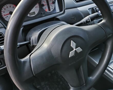 Червоний Міцубісі Lancer, об'ємом двигуна 1.6 л та пробігом 140 тис. км за 6000 $, фото 18 на Automoto.ua