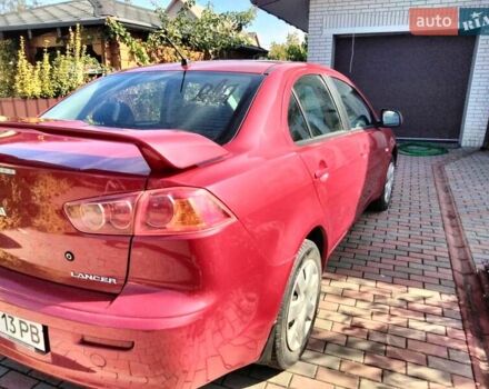 Міцубісі Lancer 2008 у Житомирі на Automoto.ua Червоний Міцубісі Lancer, об'ємом двигуна 1.5 л та пробігом 155 тис. км за 6200 $, фото 4 на Automoto.ua