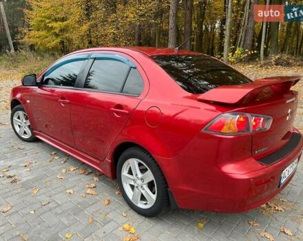 Красный Мицубиси Лансер, объемом двигателя 2 л и пробегом 197 тыс. км за 6500 $, фото 13 на Automoto.ua