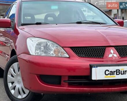 Червоний Міцубісі Lancer, об'ємом двигуна 1.58 л та пробігом 223 тис. км за 6400 $, фото 2 на Automoto.ua