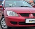 Червоний Міцубісі Lancer, об'ємом двигуна 1.58 л та пробігом 223 тис. км за 6400 $, фото 2 на Automoto.ua