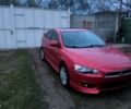 Красный Мицубиси Лансер, объемом двигателя 2 л и пробегом 270 тыс. км за 5900 $, фото 1 на Automoto.ua
