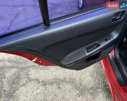 Красный Мицубиси Лансер, объемом двигателя 2 л и пробегом 330 тыс. км за 5250 $, фото 15 на Automoto.ua