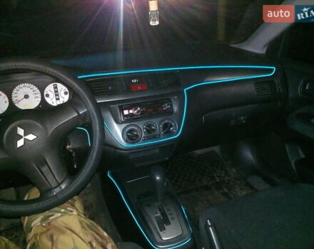 Червоний Міцубісі Lancer, об'ємом двигуна 1.6 л та пробігом 242 тис. км за 5100 $, фото 8 на Automoto.ua