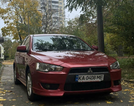 Червоний Міцубісі Lancer, об'ємом двигуна 2 л та пробігом 203 тис. км за 8000 $, фото 1 на Automoto.ua