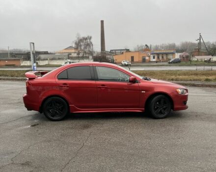 Красный Мицубиси Лансер, объемом двигателя 2 л и пробегом 223 тыс. км за 5800 $, фото 7 на Automoto.ua