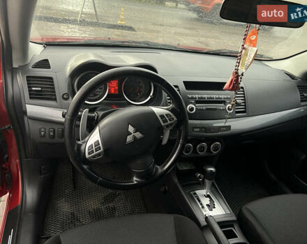 Червоний Міцубісі Lancer, об'ємом двигуна 2 л та пробігом 150 тис. км за 7000 $, фото 10 на Automoto.ua